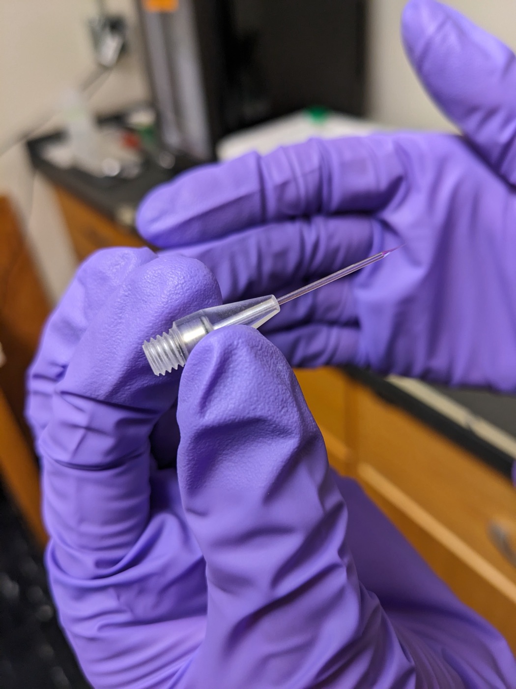 Needle in the needle holder (aka grip head)